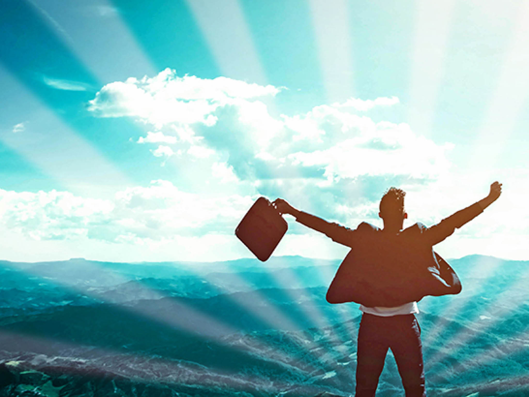 Silhouette of successful businessman keeping hands up hiking on the top of mountain - Celebrating success, winner and leader concept