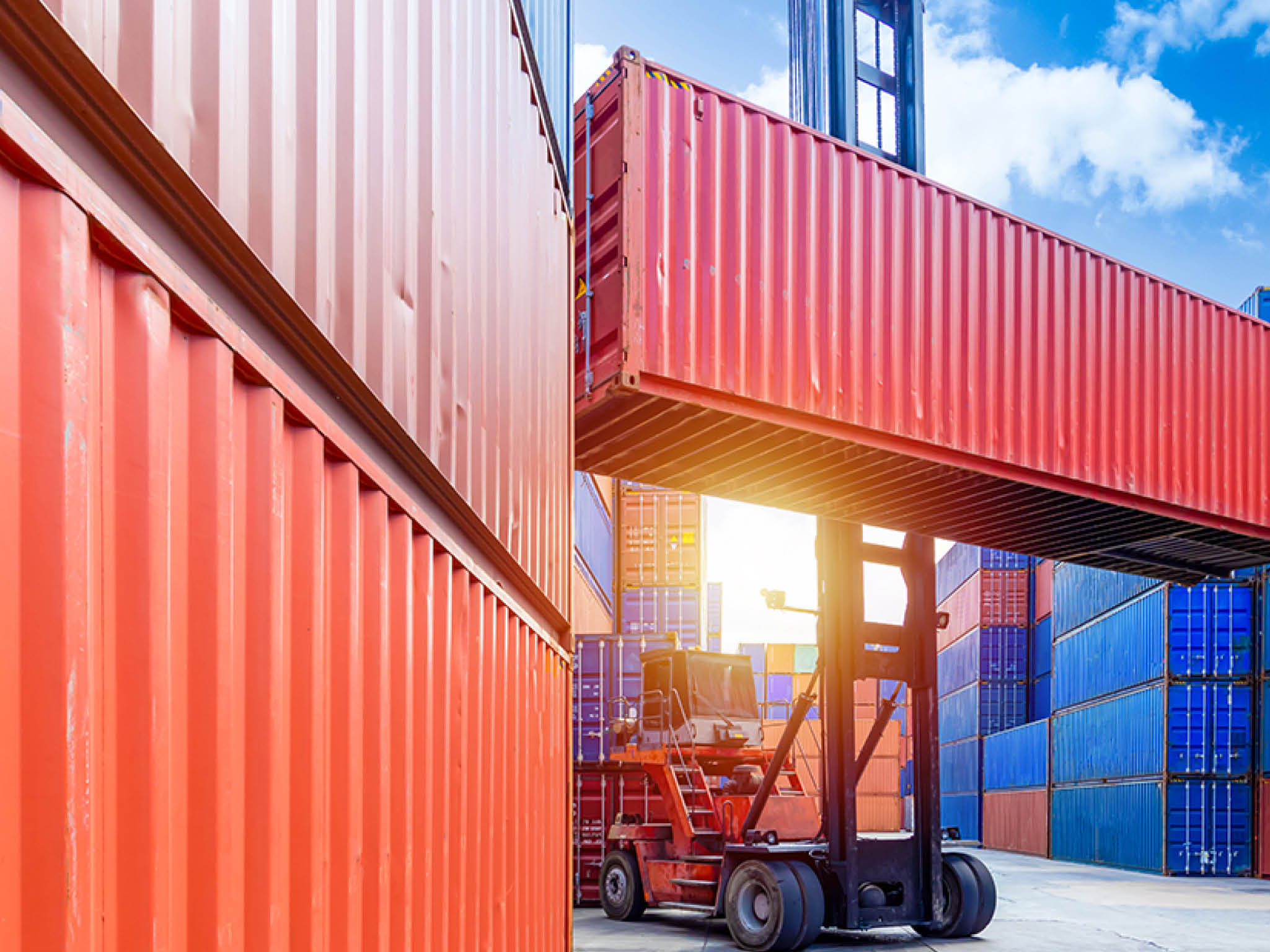 Container stacker crane lifting up stacking container box in yard, Container loading cargo freight in import and export business logistic company, Industry logistic and transportation