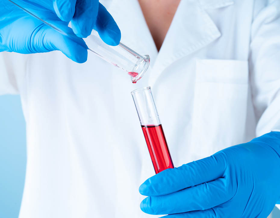 Scientific experiments in a chemistry lab. Color liquids and test tube